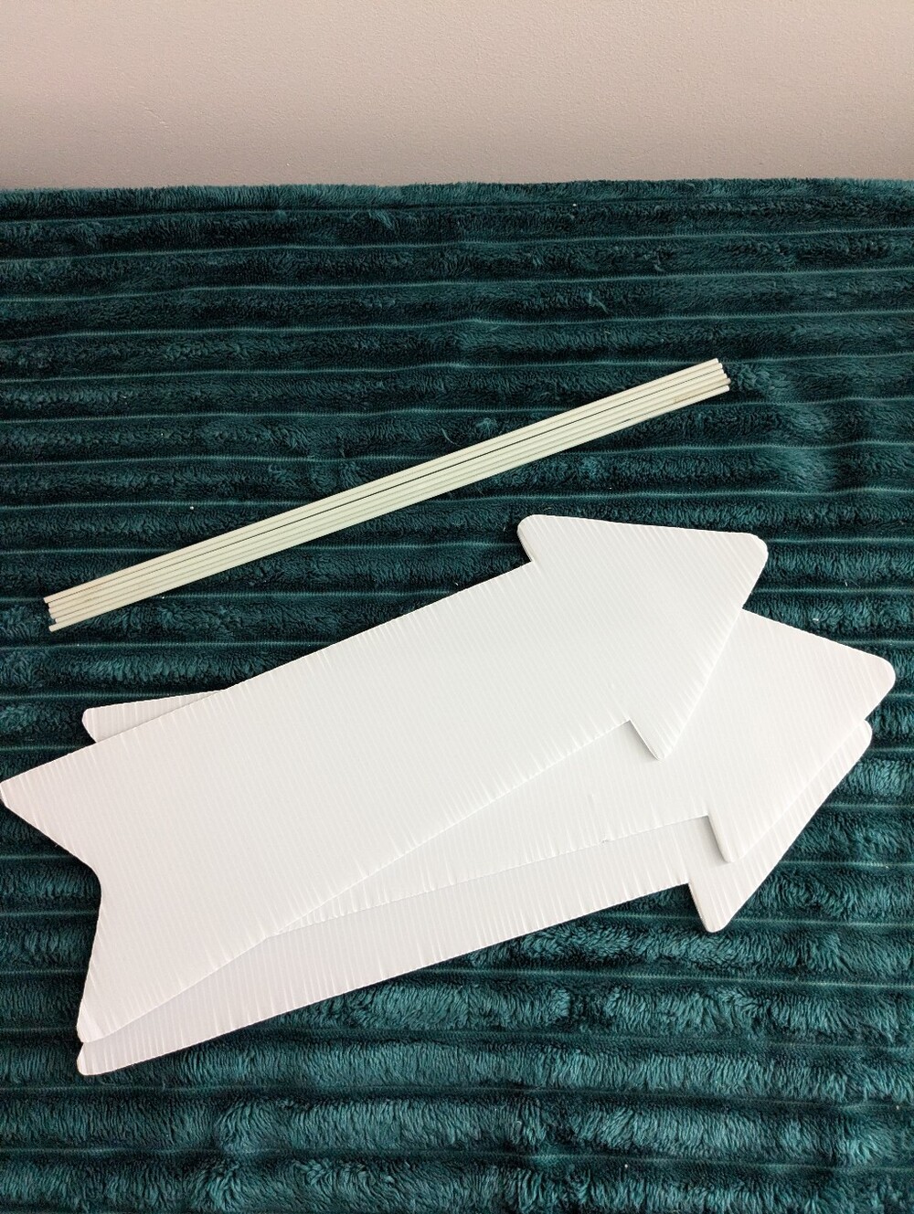 Three Plastic Arrow Signs With Stakes